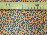 Estampado leopardo fondo naranja / 0.25 ud