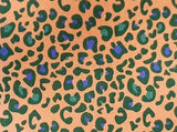 Estampado leopardo fondo naranja / 0.25 ud